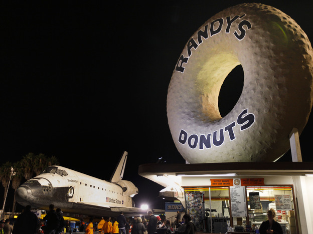 The giant doughnut in Inglewood dwarfs even the space shuttle Endeavour.