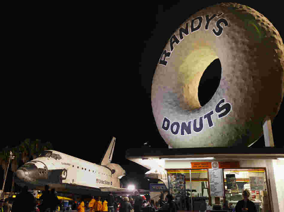 The giant doughnut in Inglewood dwarfs even the space shuttle Endeavour.