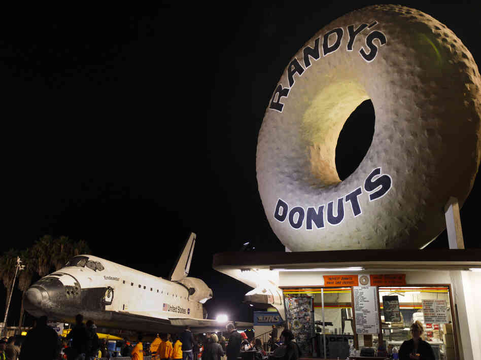 The giant doughnut in Inglewood dwarfs even the space shuttle Endeavour.