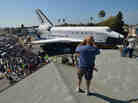 Space shuttle Endeavour travels through Los Angeles on Saturday.