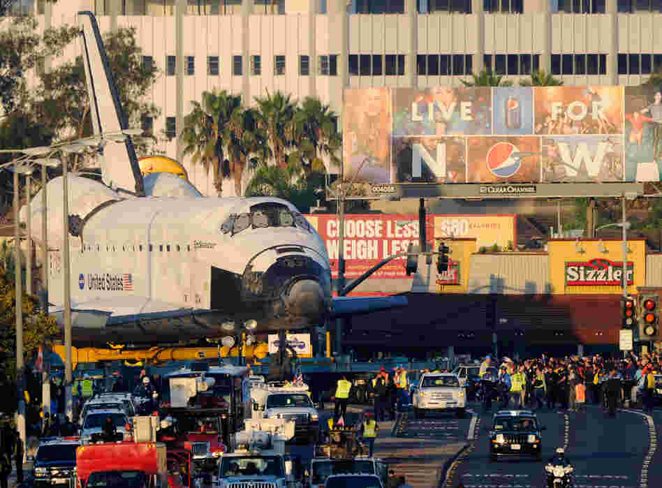The shuttle could not be taken apart without damaging the delicate tiles. Airlifting it was out of the question. So was driving on freeways since it was too massive to fit through underpasses.For most of the way, Endeavour straddled wide boulevards — Manchester, Crenshaw, Martin Luther King Jr. 