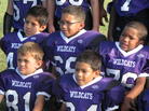 The Angleton Wildcats pose for picture day. The team of 7- and 8-year-olds is from the south Texas town of Angleton. The Angleton Wildcats pose for picture day. The team of 7- and 8-year-olds is from the south Texas town of Angleton.
