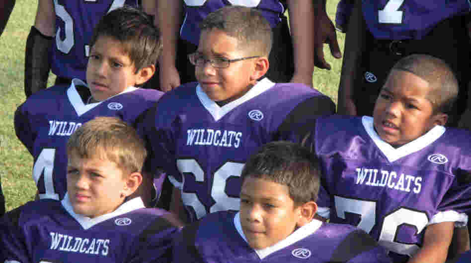 The Angleton Wildcats pose for picture day. The team of 7- and 8-year-olds is from the south Texas town of Angleton.