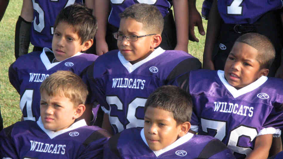 The Angleton Wildcats pose for picture day. The team of 7- and 8-year-olds is from the south Texas town of Angleton.
