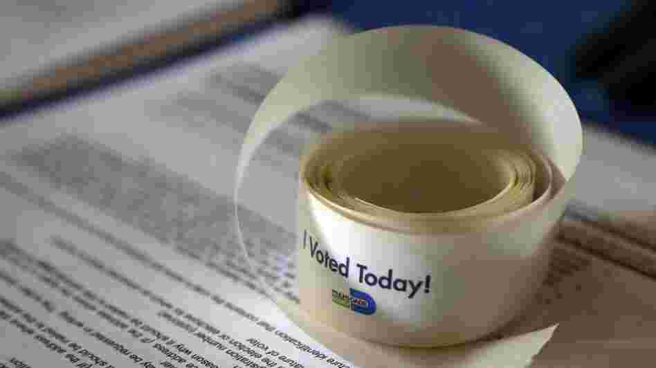 Voting stickers at the Miami-Dade County elections office on Oct. 10. A study of online conversations finds that voters in the large, diverse county are discussing issues differently from those in other parts of Florida.