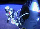 Felix Baumgartner of Austria as he jumps out of the capsule during the final manned flight for Red Bull Stratos on Sunday.