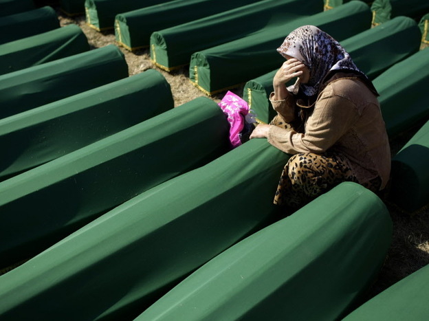 July 11, 2012: A woman cried next to the coffin of her relative at the Potocari memorial complex near Srebrenica. More than 8,000 Muslim men and boys were executed there in July 1995. It was the worst massacre in Europe since World War II.
