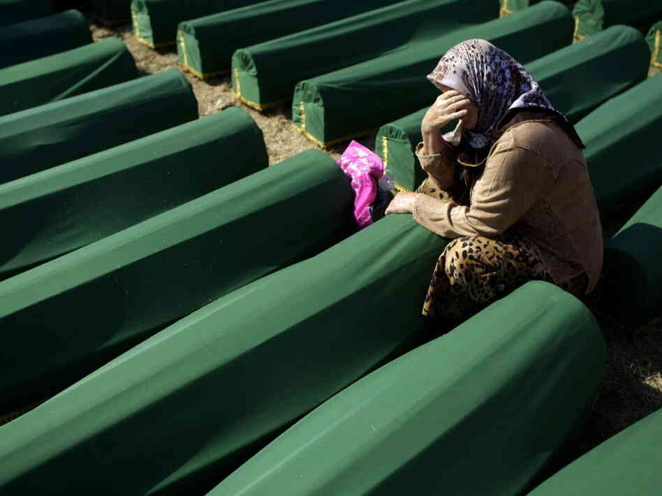 July 11, 2012: A woman cried next to the coffin of her relative at the Potocari memorial complex near Srebrenica. More than 8,000 Muslim men and boys were executed there in July 1995. It was the worst massacre in Europe since World War II.