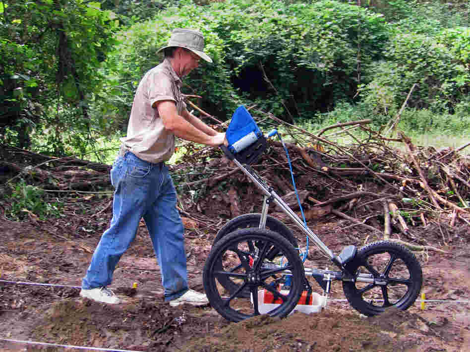Using ground penetrating radar, archaeologist Richard Estabrook has identified dozens of previously unknown graves at the school's cemetery.