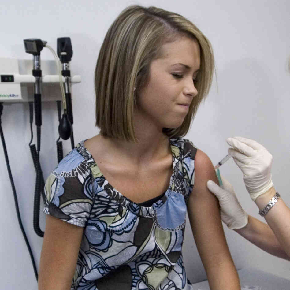 An 18 Year Old Girl Winces As She Has Her Third And Final Shot Of The Hpv Vaccine