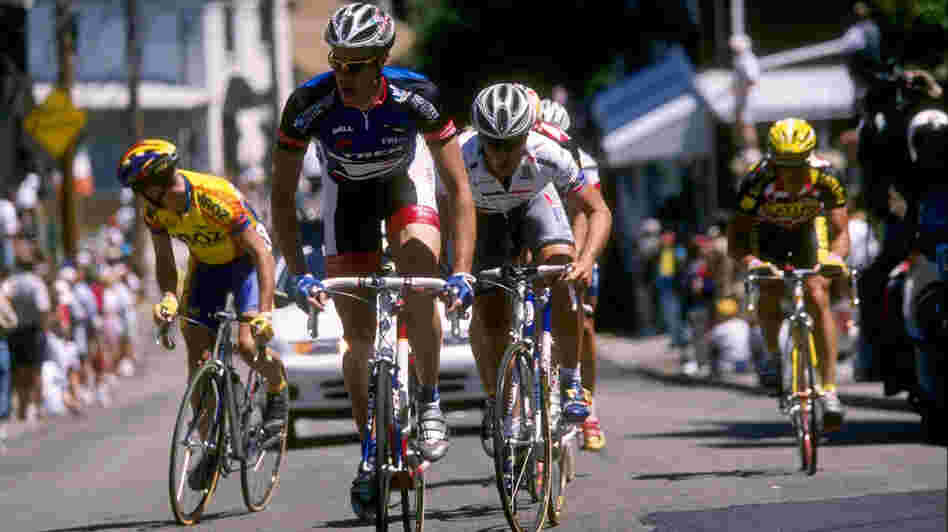 Former cyclist Scott Mercier has gained notoriety for refusing to go on a doping program 15 years ago. Here, Mercier (in blue jersey) rides just ahead of cyclist Chris Horner in 1997.