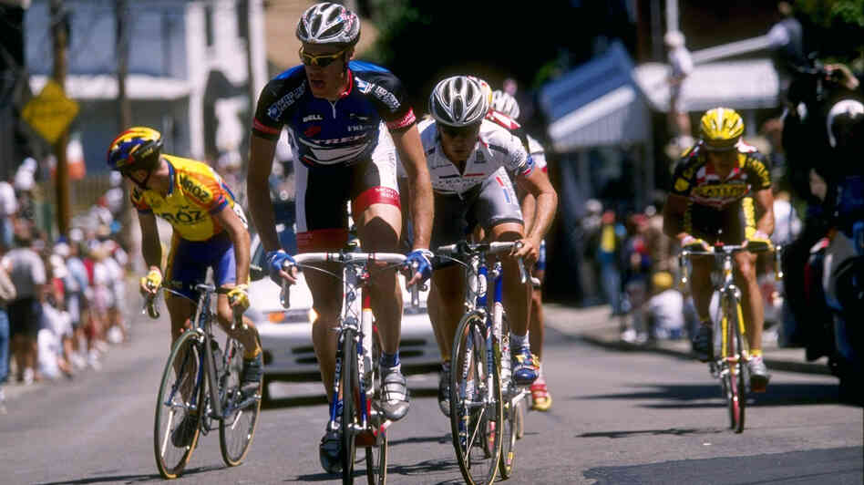 Former cyclist Scott Mercier has gained notoriety for refusing to go on a doping program 15 years ago. Here, Mercier (in blue jersey) rides just ahead of cyclist Chris Horner in 1997.