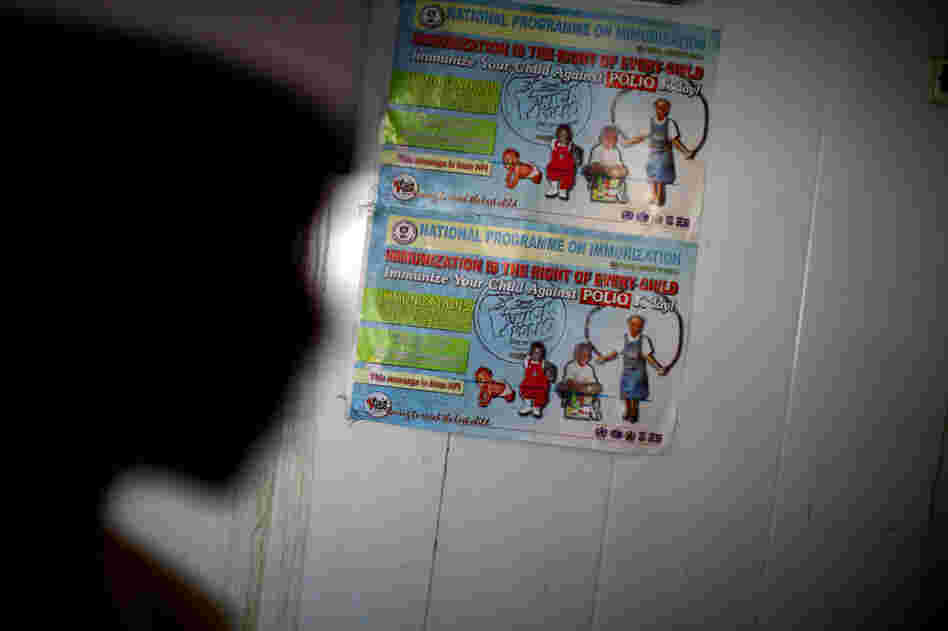 A polio immunization poster is taped on a walk-in refrigerator at a new cold storage facility at a hospital in Kano. The oral polio vaccine must be kept refrigerated; that's been a challenge in a place with only intermittent access to electricity.