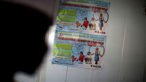 A polio immunization poster is taped on a walk-in refrigerator at a new cold storage facility at a hospital in Kano. The oral polio vaccine must be kept refrigerated; that's been a challenge in a place with only intermittent access to electricity.