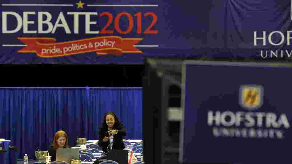 Media sets up in Spin Alley as they prepare for the debate between Republican presidential candidate Mitt Romney and and President Barack Obama.