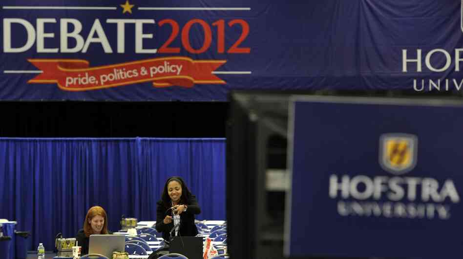 Media sets up in Spin Alley as they prepare for the debate between Republican presidential candidate Mitt Romney and and President Barack Obama.