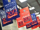 Banners hang inside the media center amid preparations for tonight's presidential debate at Hofstra University in Hempstead, N.Y. Banners hang inside the media center amid preparations for tonight's presidential debate at Hofstra University in Hempstead, N.Y.