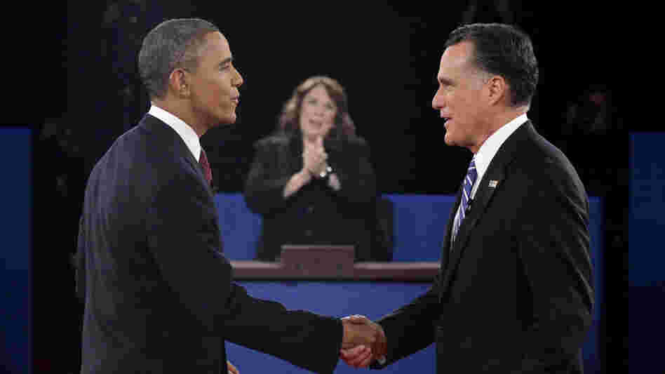 President Obama and Republican nominee Mitt Romney shake hands before their debate Tuesday in Hempstead, N.Y.