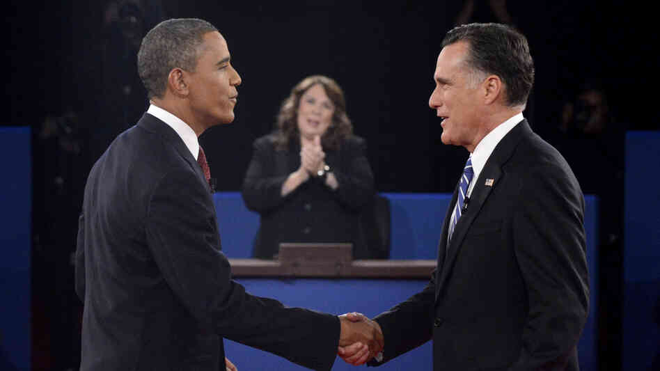 President Obama and Republican nominee Mitt Romney shake hands before their debate Tuesday in Hempstead, N.Y.