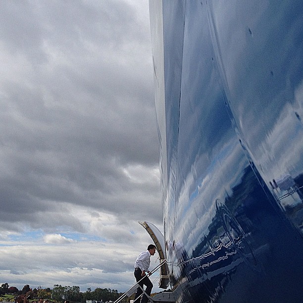 Mitt Romney boards campaign charter plane in Bedford, Ma., as he travels to Denver. <a href=