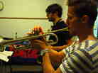 Philip Dizack at WBGO, with saxophonist Jake Saslow in the background.