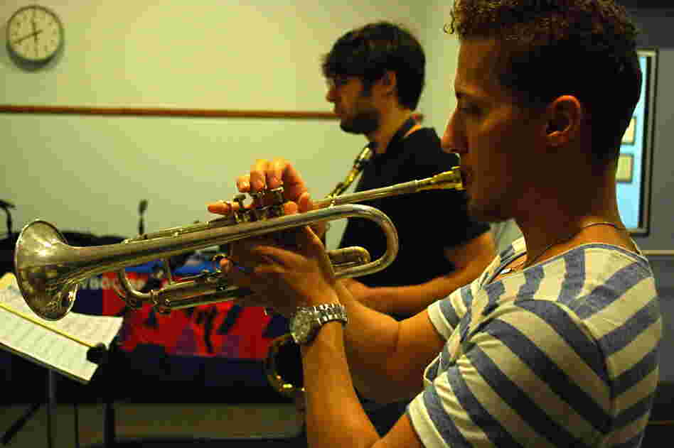 Philip Dizack at WBGO, with saxophonist Jake Saslow in the background.