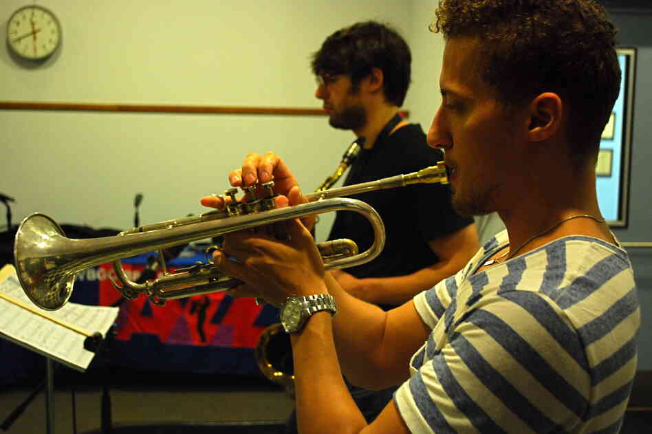 Philip Dizack at WBGO, with saxophonist Jake Saslow in the background.
