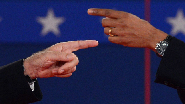 The fingers tell the story: At times, President Obama and Republican challenger Mitt Romney got very close Tuesday night during their exchanges.