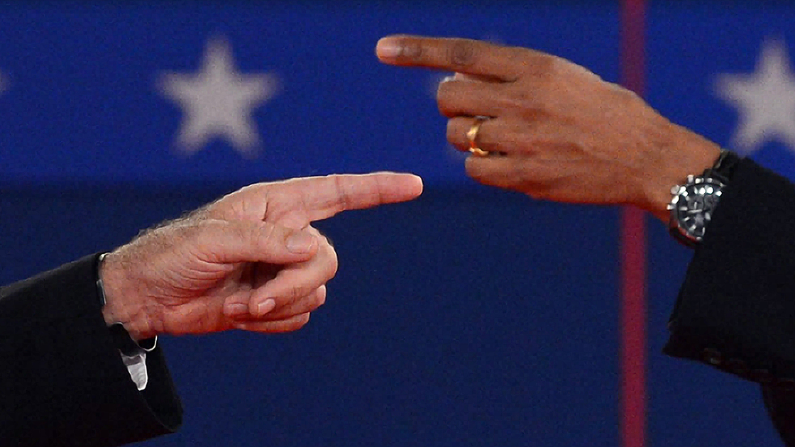 The fingers tell the story: At times, President Obama and Republican challenger Mitt Romney got very close Tuesday night during their exchanges.