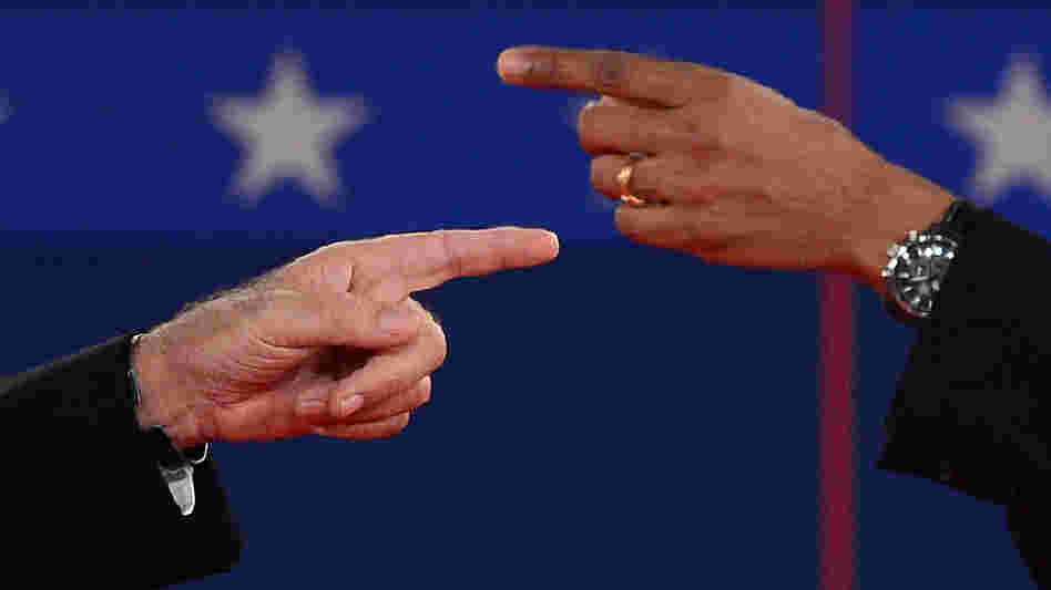 The fingers tell the story: At times, President Obama and Republican challenger Mitt Romney got very close Tuesday night during their exchanges.