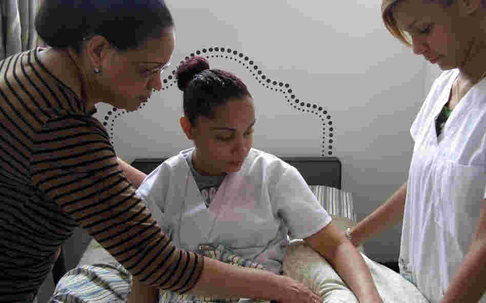 Home health aide trainees Marisol Maldonaldo (center) and Nancy Brown (right), shown here with assistant instructor Miguelina Sosa, are studying to join one of the nation's fastest growing yet also worst paid sectors of the workforce. Home health aide trainees Marisol Maldonaldo (center) and Nancy Brown (right), shown here with assistant instructor Miguelina Sosa, are studying to join one of the nation's fastest growing yet also worst paid sectors of the workforce.