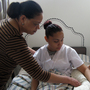 Home health aide trainees Marisol Maldonaldo (center) and Nancy Brown (right), shown here with assistant instructor Miguelina Sosa, are studying to join one of the nation's fastest growing yet also worst paid sectors of the workforce.