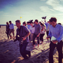 Reporter Ashley Parker transmitted these two different views of the campaign trail via Instagram. In the photo on the left, Mitt and Ann Romney stroll on the beach. On the right, the media pool chases after them. Reporter Ashley Parker transmitted these two different views of the campaign trail via Instagram. In the photo on the left, Mitt and Ann Romney stroll on the beach. On the right, the media pool chases after them.