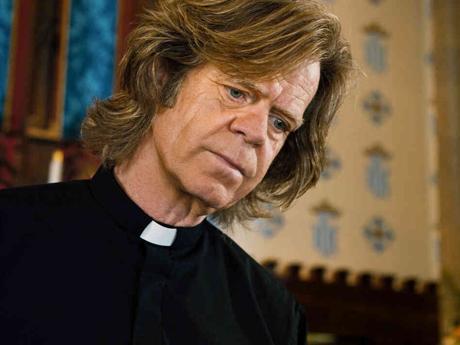 Father Brendan (William H. Macy) talks Mark through the ethical and religious questions posed by his arrangement. Father Brendan (William H. Macy) talks Mark through the ethical and religious questions posed by his arrangement.