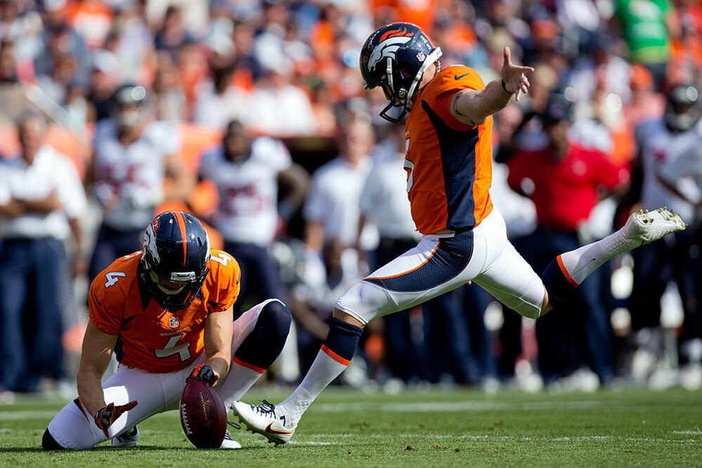 Place kicker Matt Prater of the Denver Broncos kicks a second quarter field goal on a hold by Britton Colquitt against the Houston Texans at Sports Authority Field Field at Mile High in Denver on Sept. 23.