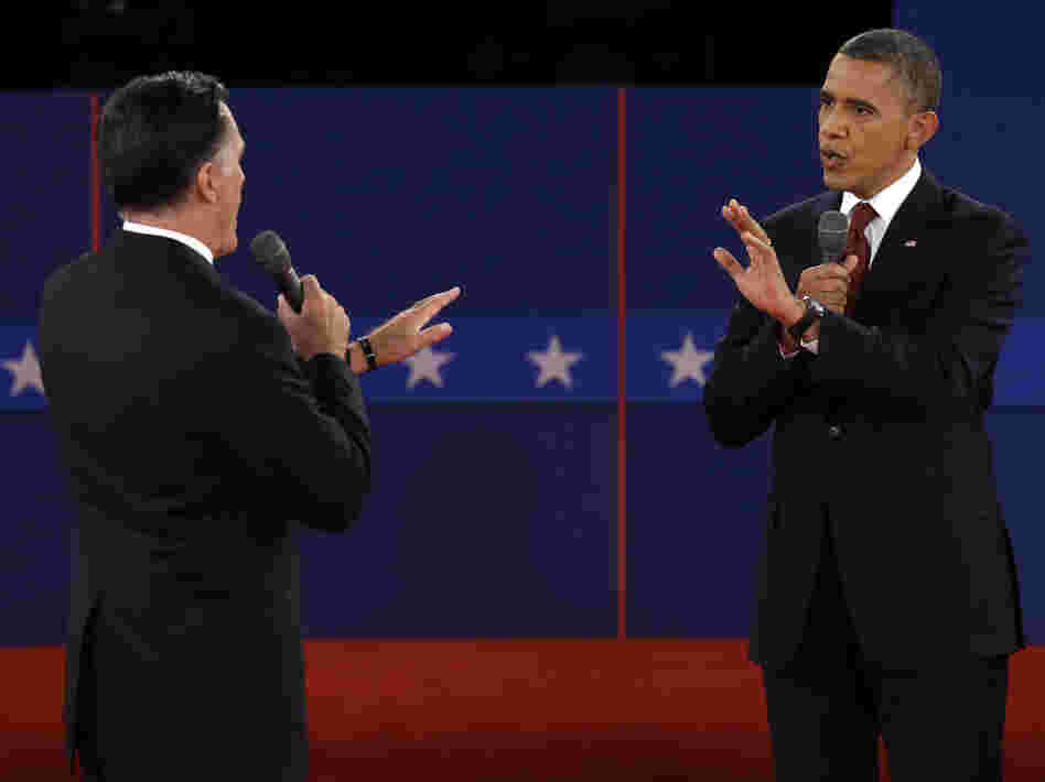 Republican presidential nominee Mitt Romney and President Obama spar over energy policy during the second presidential debate at Hofstra University on Tuesday.