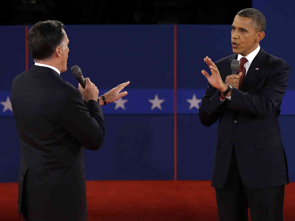 Republican presidential nominee Mitt Romney and President Obama spar over energy policy during the second presidential debate at Hofstra University on Tuesday.