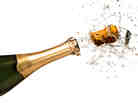Close-up of explosion of champagne bottle cork