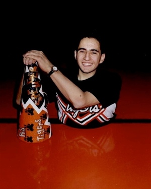 Spencer West proved that he could excel at sports, including cheerleading.