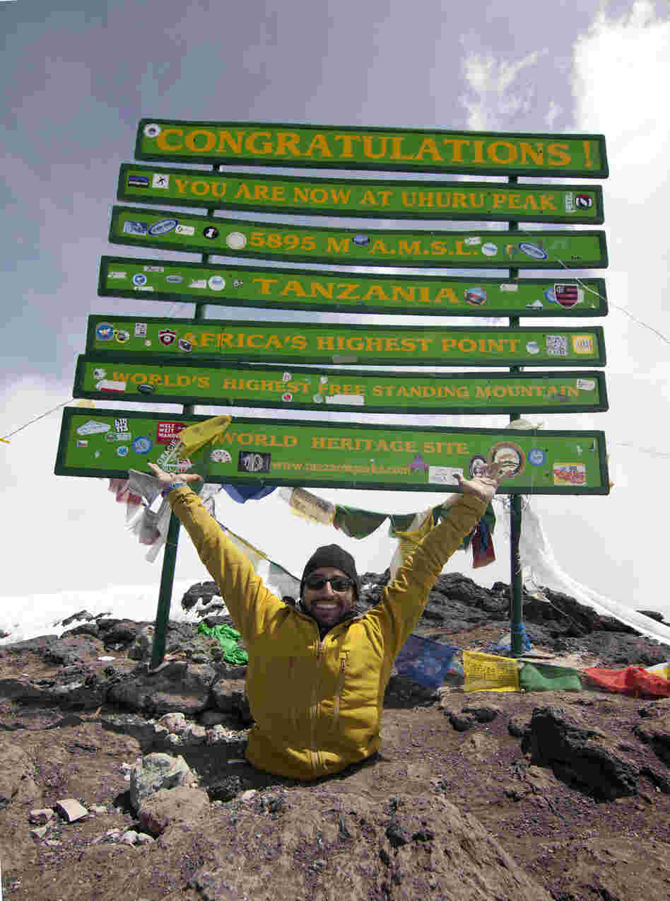 Spencer West at the summit of Mount Kilimanjaro.