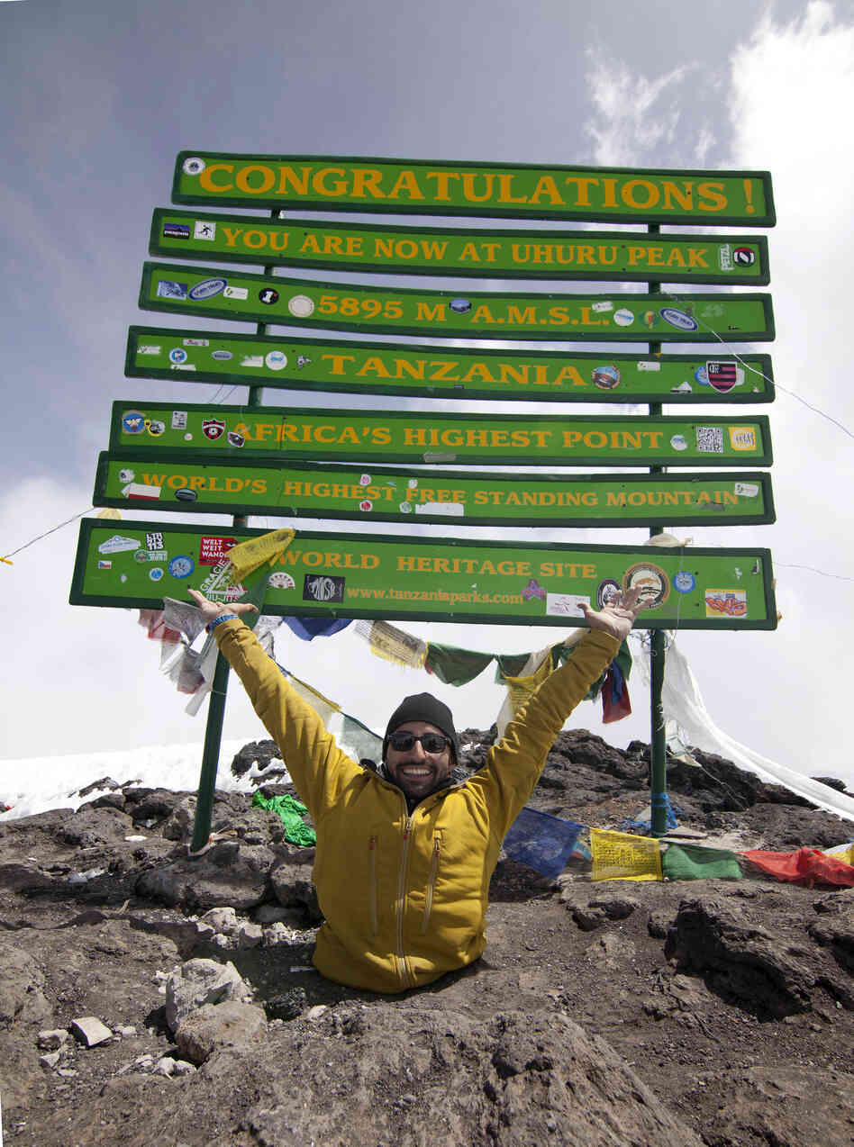 Spencer West at the summit of Mount Kilimanjaro.