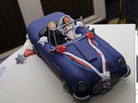 A special cake re-enacting the scene of Prince William, Duke of Cambridge's wedding in 2011 where he drove the car with his wife the Catherine, Duchess of Cambridge, as he attends a reception prior to the annual October Club dinner in aid of the St Giles Trust on Wednesday night. A special cake re-enacting the scene of Prince William, Duke of Cambridge's wedding in 2011 where he drove the car with his wife the Catherine, Duchess of Cambridge, as he attends a reception prior to the annual October Club dinner in aid of the St Giles Trust on Wednesday night.