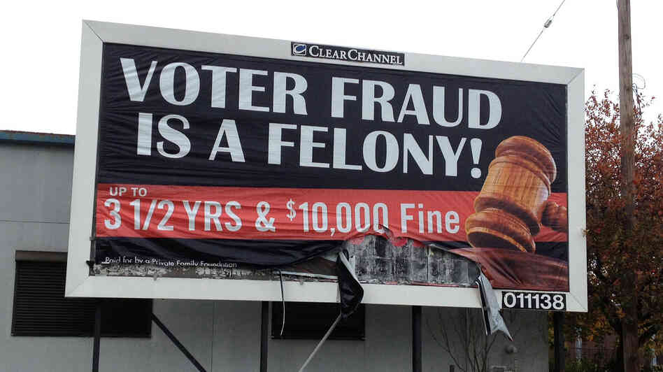 An anonymous "family foundation" is paying for billboards warning against voter fraud, like this one in a minority neighborhood on the east side of Cleveland. Clear Channel, which owns the space, says the anonymity violates its policies but it will not take the ads down.