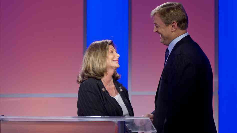 Democatic Rep. Shelley Berkley greets Republican Sen. Dean Heller before the second of their three debates, on Oct. 11 in Las Vegas.