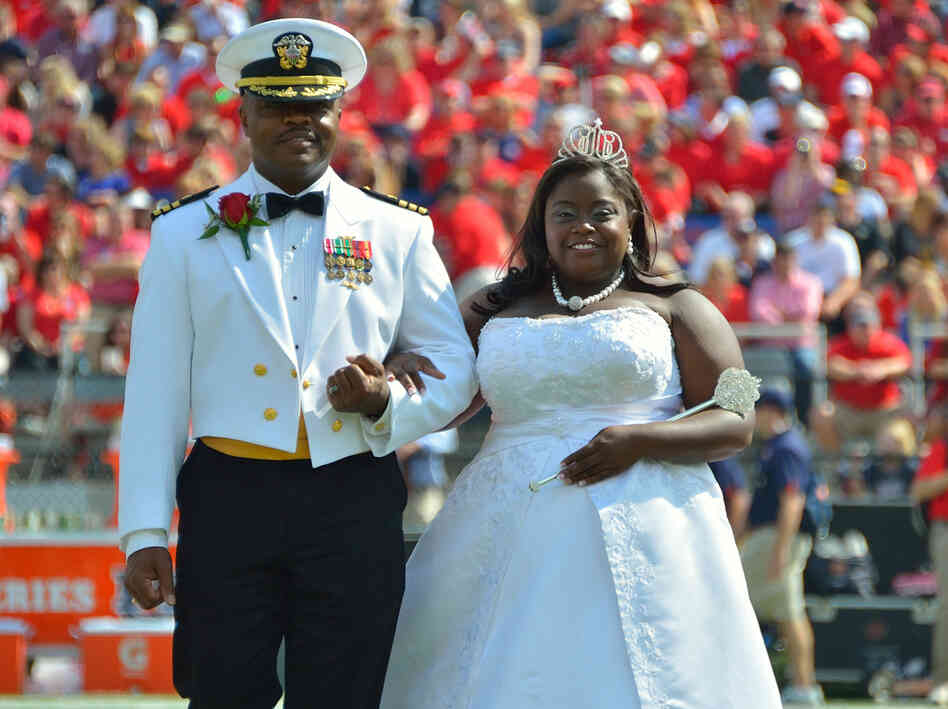 University of Mississippi Homecoming Queen Courtney Pearson, as she was escorted on to the football field last Saturday by her father, Cmdr. Kerry Pearson.