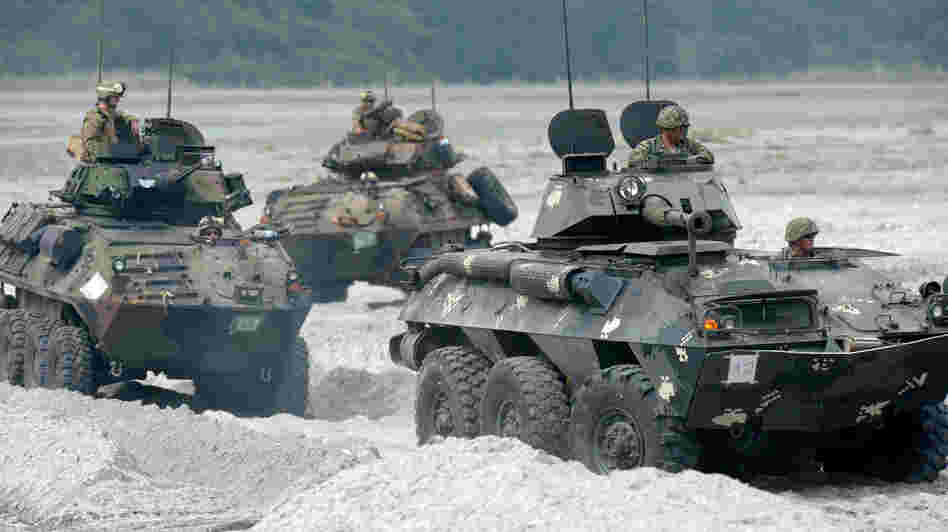 U.S. Marines drive amphibious armored personnel carriers in the Philippines on Oct. 9, as part of the annual joint exercises with Philippine counterparts. U.S. Marines drive amphibious armored personnel carriers in the Philippines on Oct. 9, as part of the annual joint exercises with Philippine counterparts.