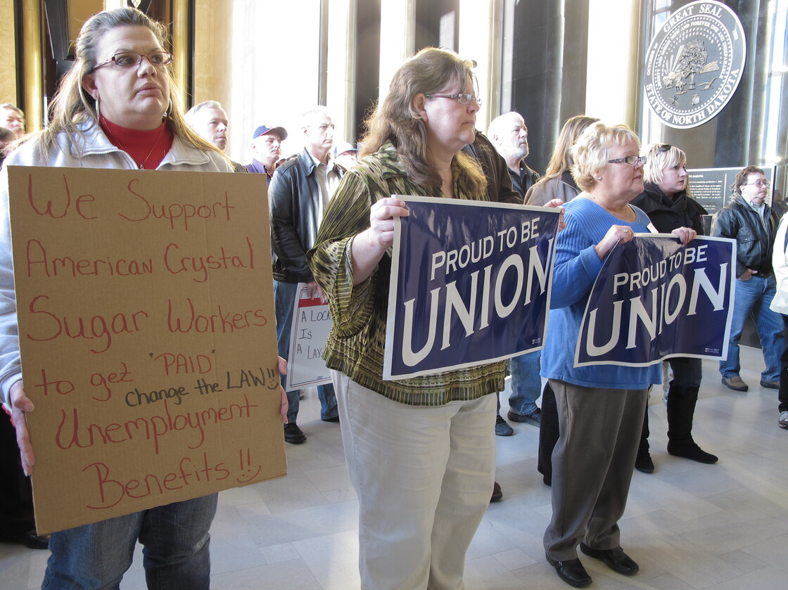 Supporters of American Crystal Sugar Co. workers, who have been locked out of the company's sugar beet processing plants since 2011, rally in the North Dakota Capitol.