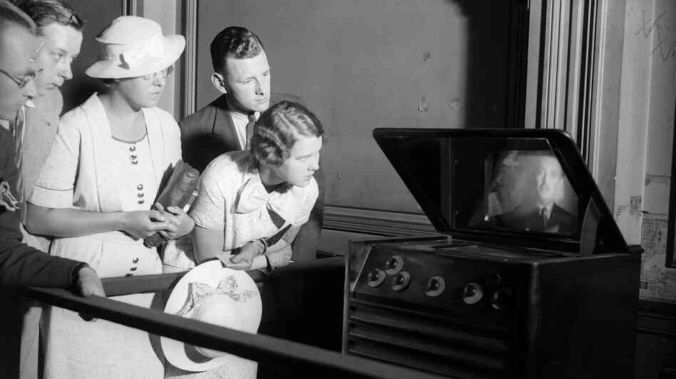 In 1936, a television drew a crowd at London's Waterloo station. Today, the crowd would have video screens in their pockets. In 1936, a television drew a crowd at London's Waterloo station. Today, the crowd would have video screens in their pockets.