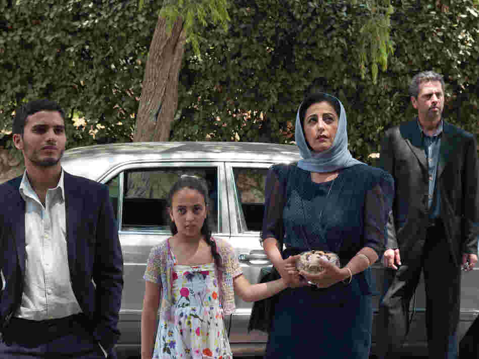The Al Bezaaz family visits their son's birth family with some hesitation. The Al Bezaaz family visits their son's birth family with some hesitation.