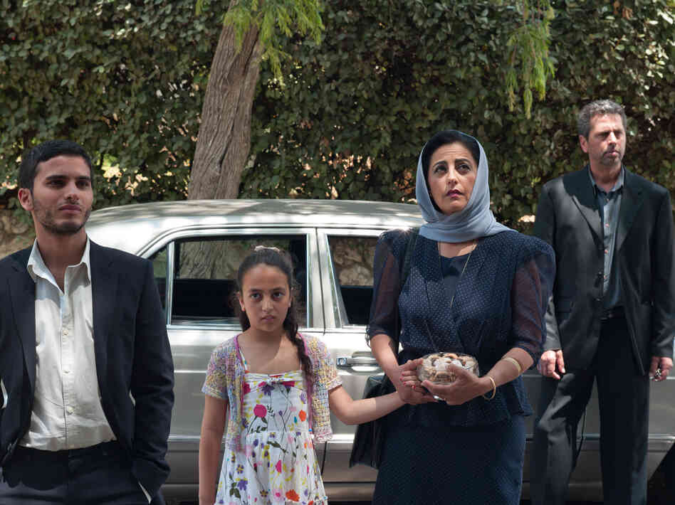The Al Bezaaz family visits their son's birth family with some hesitation. The Al Bezaaz family visits their son's birth family with some hesitation.